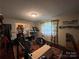 Home exercise room with elliptical, treadmill and weight bench at 5419 Stevens Mill Rd, Matthews, NC 28104