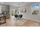 Charming dining area with glass table and four chairs at 310 New Bern Ave, Statesville, NC 28677