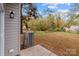 View of backyard with shed and tree line at 310 New Bern Ave, Statesville, NC 28677