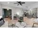 Open-concept living room and kitchen with hardwood floors at 310 New Bern Ave, Statesville, NC 28677
