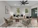 Living room with a neutral color palette and hardwood floors at 310 New Bern Ave, Statesville, NC 28677