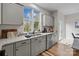 Modern kitchen with stainless steel appliances and island at 310 New Bern Ave, Statesville, NC 28677