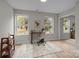 Bright home office features built-in shelving, large windows, and a mirrored closet at 310 New Bern Ave, Statesville, NC 28677