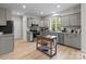 Modern kitchen with stainless steel appliances and island at 310 New Bern Ave, Statesville, NC 28677
