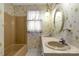 Bathroom with double vanity, vintage wallpaper, and a tub at 1836 Westbrook Rd, Edgemoor, SC 29712