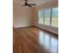 Spacious living room featuring hardwood floors and large windows at 501 Chestnut Grove Rd, Statesville, NC 28625