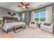 Spacious primary bedroom with sitting area and large window at 1205 Red River Dr, Salisbury, NC 28144