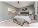 Bright bedroom with a king-size bed and calming decor at 1205 Red River Dr, Salisbury, NC 28144