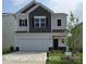 Two story house with gray and beige exterior at 1205 Red River Dr, Salisbury, NC 28144