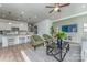 Open living room and kitchen area with green accent chairs at 1205 Red River Dr, Salisbury, NC 28144
