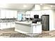 Modern kitchen with white cabinets and island at 00 Wilson Ct # 11, Lincolnton, NC 28092