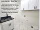 Laundry room with cabinets and granite countertop at 00 Wilson Ct # 11, Lincolnton, NC 28092