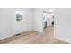 Light and airy dining area with wood-look flooring and kitchen views at 215 Bethesda Rd, Statesville, NC 28677