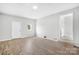 Unfinished basement with vinyl flooring and exterior access at 215 Bethesda Rd, Statesville, NC 28677