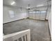 Spacious garage with automatic door opener and concrete floor at 00 Wilson Ct # 16, Lincolnton, NC 28092