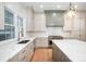 Modern kitchen with stainless steel appliances, large island, and hardwood floors at 4013 Nettie Ct # 6, Charlotte, NC 28211