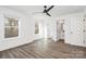 Spacious bedroom with ceiling fan and en-suite bathroom at 1975 Ripplerock Rd, Fort Mill, SC 29715