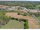 Wide shot of land with a house and road at 112 W Highway 218 Rd, Monroe, NC 28110