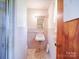 Clean bathroom, tiled shower, and vanity at 112 W Highway 218 Rd, Monroe, NC 28110