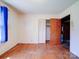 Bedroom with hardwood floors and closet at 112 W Highway 218 Rd, Monroe, NC 28110