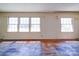 Dining room with hardwood floors and large windows at 112 W Highway 218 Rd, Monroe, NC 28110