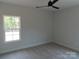 Spacious bedroom with large window and neutral carpeting at 2223 Cedar Rd # 2, York, SC 29745