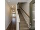 Elegant staircase leading to the upper level at 512 Kingsway Cir, Charlotte, NC 28214