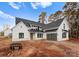 Modern farmhouse style home with white exterior and gray roof at 19413 Coachmans Trce, Cornelius, NC 28031