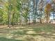 Fall foliage surrounds this spacious backyard with mature trees at 111 Bobby Lee Ln # 18, Mooresville, NC 28115