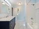 Updated bathroom with marble-top vanity, bathtub, and shower at 111 Bobby Lee Ln # 18, Mooresville, NC 28115