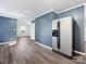 Stainless steel refrigerator in a kitchen with gray walls at 111 Bobby Lee Ln # 18, Mooresville, NC 28115