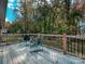 Relaxing deck overlooking a wooded backyard at 111 Bobby Lee Ln # 18, Mooresville, NC 28115