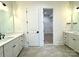 Elegant bathroom with double vanity and walk-in closet at 3860 Nc Hwy 200 Hwy, Concord, NC 28025