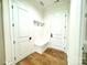 Laundry room with upper cabinets and built-in bench at 3860 Nc Hwy 200 Hwy, Concord, NC 28025