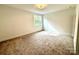 Spacious bedroom with neutral walls and carpeting at 3860 Nc Hwy 200 Hwy, Concord, NC 28025