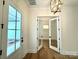Bright entryway with hardwood floors and French doors leading to an office at 3860 Nc Hwy 200 Hwy, Concord, NC 28025