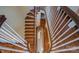 Spiral staircase with a unique top-down perspective, highlighting design details at 2929 Laura Rd, Shelby, NC 28150