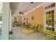 Covered back porch features a table, chairs, and access to the house at 2929 Laura Rd, Shelby, NC 28150