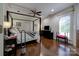 Spacious bedroom with hardwood floors and a four-poster bed at 2929 Laura Rd, Shelby, NC 28150