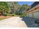 Three-car garage with a long driveway at 2929 Laura Rd, Shelby, NC 28150