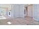 Elegant entryway with hardwood floors and French doors leading to the staircase at 106 Windbluff Ct # 163, Statesville, NC 28677