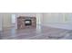Living room with hardwood floors, stone fireplace, and french doors at 106 Windbluff Ct # 163, Statesville, NC 28677
