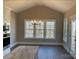 Breakfast area with hardwood floors and large windows offering a wooded view at 156 Clear Springs Rd, Mooresville, NC 28115