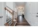 Bright entryway with hardwood floors, staircase, and neutral-toned walls at 108 1St St, Huntersville, NC 28078