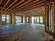 Interior of a new home under construction with large windows at 1969 Maryland Ave, Charlotte, NC 28209