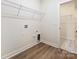 Laundry room with flooring and access to additional closet at 1005 Piper Meadows Dr # 1, Waxhaw, NC 28173