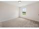 Bedroom featuring a large window with pastoral view at 1005 Piper Meadows Dr # 1, Waxhaw, NC 28173