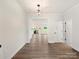 Bright foyer with hardwood floors and view to living area at 1005 Piper Meadows Dr # 1, Waxhaw, NC 28173