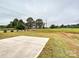 New home with a large grassy front yard and concrete driveway at 1005 Piper Meadows Dr # 1, Waxhaw, NC 28173