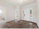 Light and airy entryway with hardwood floors at 1005 Piper Meadows Dr # 1, Waxhaw, NC 28173